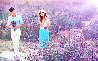 love-couple-wandering-in-the-flower-farm