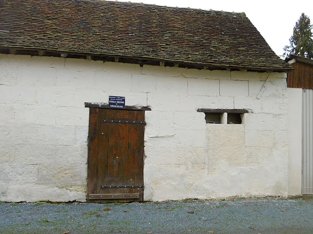 Barn with an old 'TB free' declaration above the door. Indre et Loire, France. Photo by Loire Valley Time Travel.