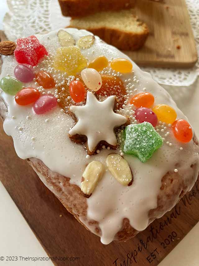 Christmas pound cake decorated with icing, jelly beans, candy