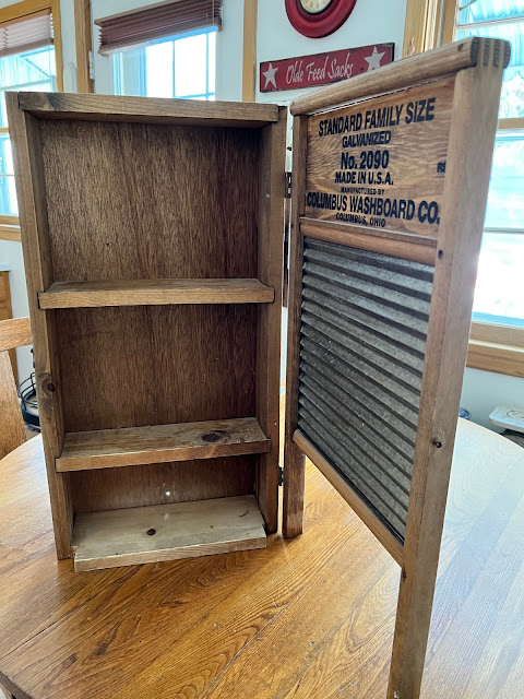 Photo of a vintage washboard and a homemade shelf back.