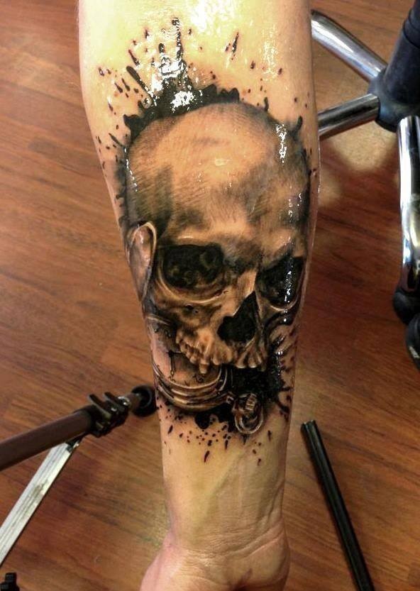 Super realistic skull with watches tattoo by Line Marielle