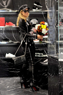 Paris Hilton Shopping in Black Dress at Philipp Plein Boutique in Milan