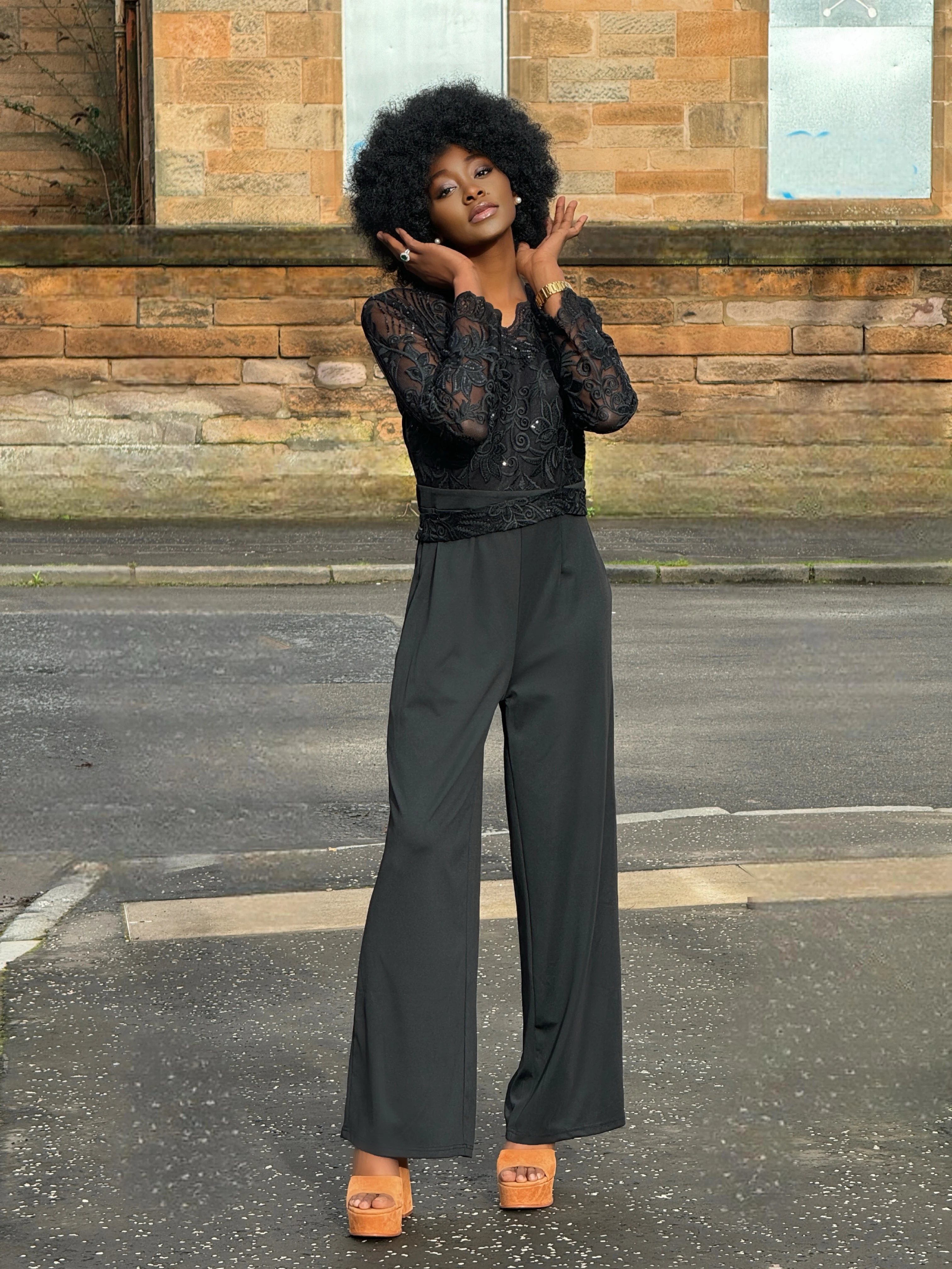 Fashion Blogger wearing a black jumpsuit