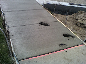 wet cement, concrete footprints