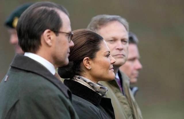 Crown Princess Victoria wore a beige sweater by Andiata, dark grey jacket. Eric Bompard Pea jacket pullover in beige