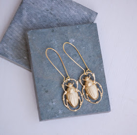 https://www.etsy.com/listing/226803713/gold-beetle-earrings-nature-study?ref=shop_home_active_2&ga_search_query=beetle