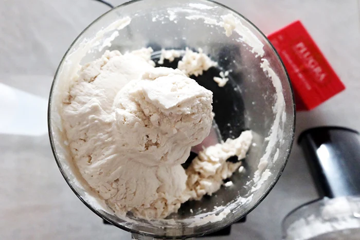 dough ball formed on food processor blade