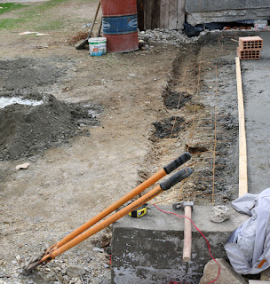 A trench dug, and reinforcement installed