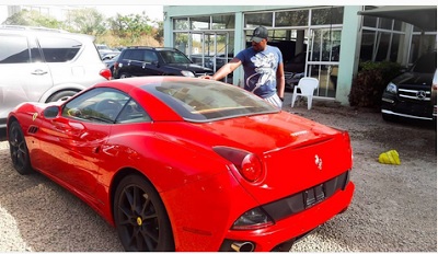 Wife of Nollywood actor, Mofe Duncan, gets him a band new red toy as Valentine gift (photos)