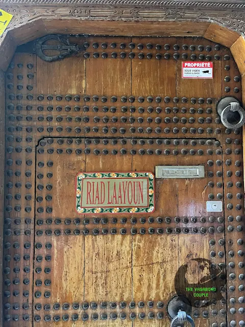 Upper knocker on door of old Moroccan house