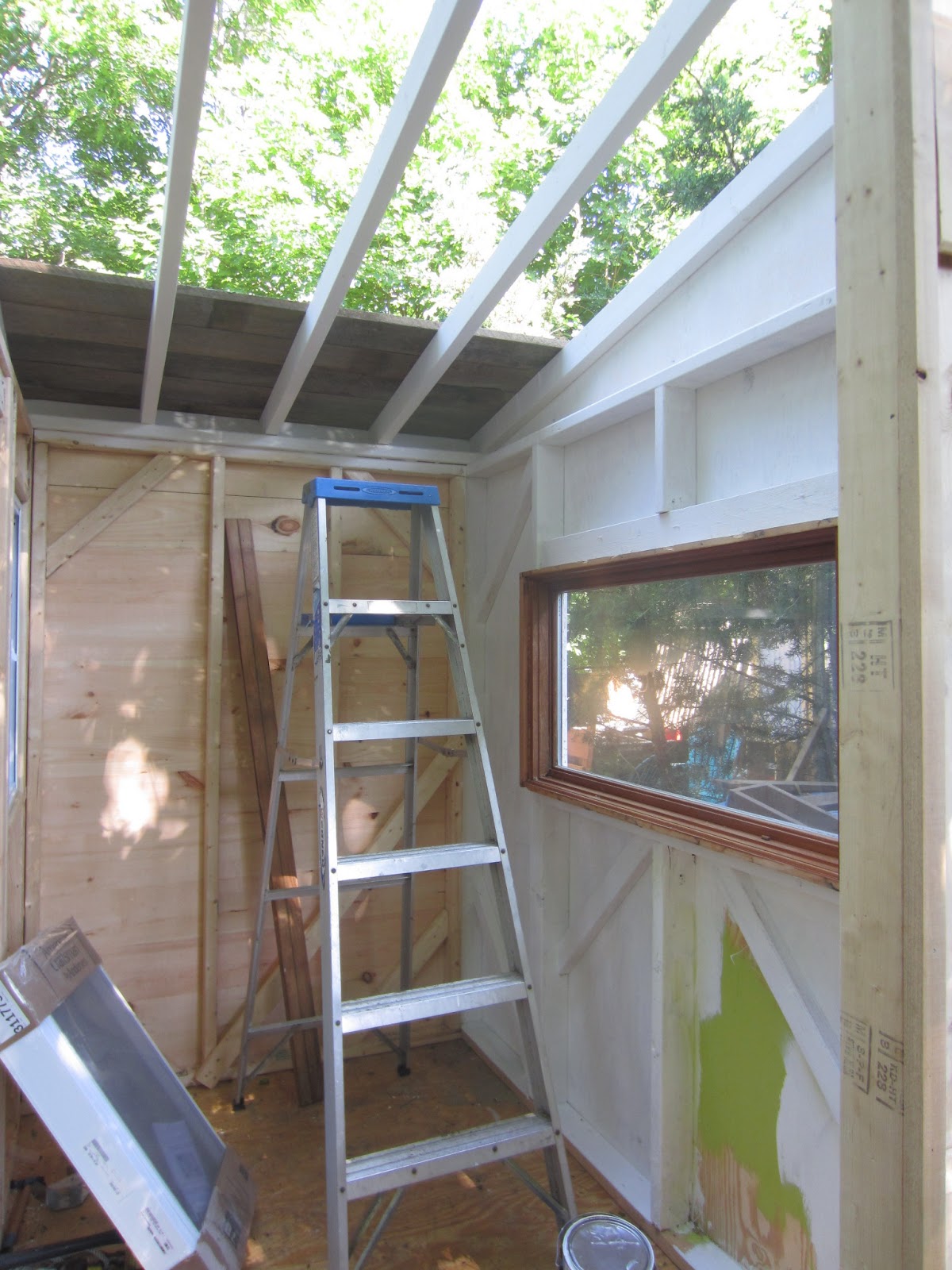 Relaxshacks A recycled barn wood fence plank ceiling in a tiny