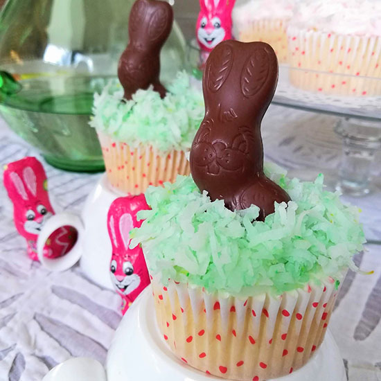 Foil covered bunnies on cupcakes with green shredded coconut, easter bunny cupcake hack, easter bunny cupcake decorating ideas, easter bunny coconut cupcakes, easter desserts, easter recipes, shredded coconut, easter bunny cupcake topper, easy chocolate bunny cupcakes