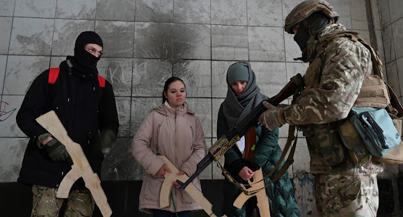 Joining the Battle, Ukrainian Civilians in Bucha Undergo Military Training