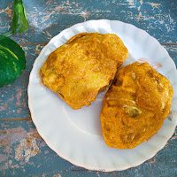 Cabbage Parcels are stuffed cabbage fritters where a spicy mashed potato mixture is stuffed inside cabbage leaves and dipped into a spicy batter and then fried till golden brown.