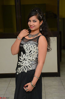 Shrisha Dasari in Sleeveless Short Black Dress At Follow Follow U Audio Launch 076.JPG