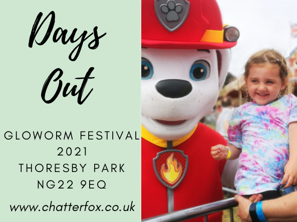 Image of a young girl smiling whilst having her photo taken with Marshall, the dalmation fire fighter from Paw Patrol. Alongside the image is a title that reads 'Days out, Gloworm Children's Festival 2021, Thoresby Park, NG22 9EQ www.chatterfox.co.uk'
