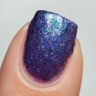 purple nail polish with silver flakes