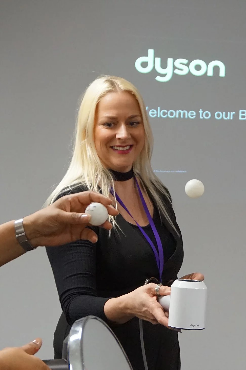 Tracie Bedwood performing ping pong test with Dyson Supersonic