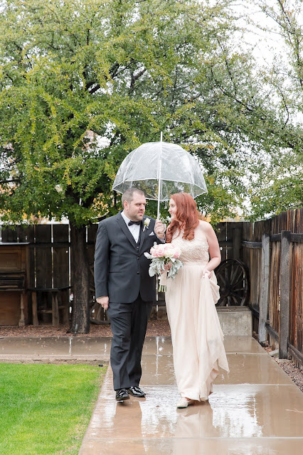 Shenandoah Mill Wedding Bride and Groom Rainy day portraits with clear umbrella by Micah Carling Photography