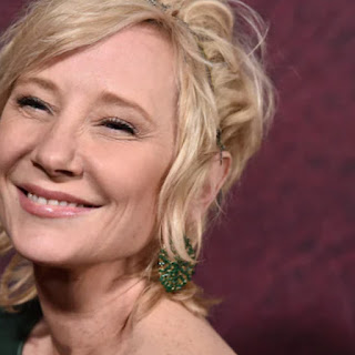 According to her rep, Anne Heche is in a coma after crashing her car into her home.