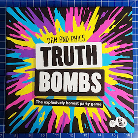Truth Bombs Party Game Review front of box with colourful explosion