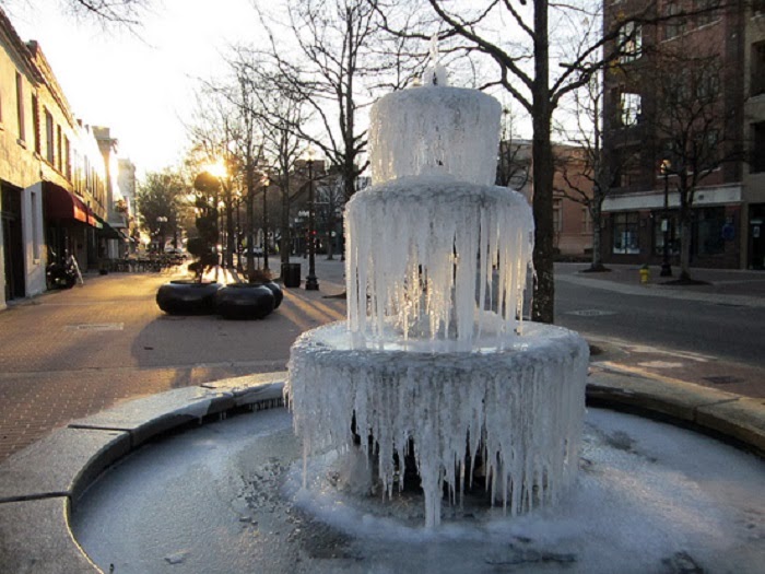 Fayetteville, N.C. - Winter Blast Transforms Water Fountains Into Magical Ice Sculptures