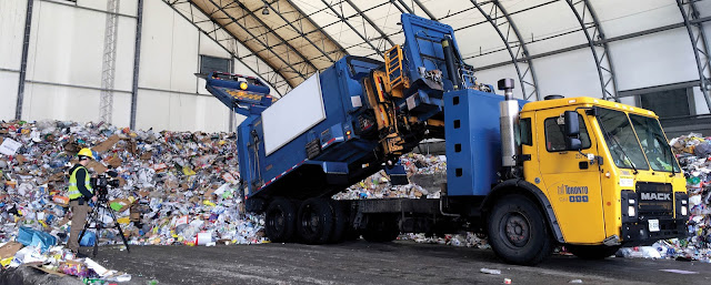 Exploring the lifecycle of plastics by NIcholas de Pencier on location at a Toronto transfer station shooting for The Anthropocene Education Program