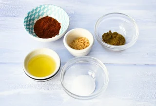 olive oil and spice in pinch bowls