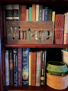 Vintage sign in a book shelf