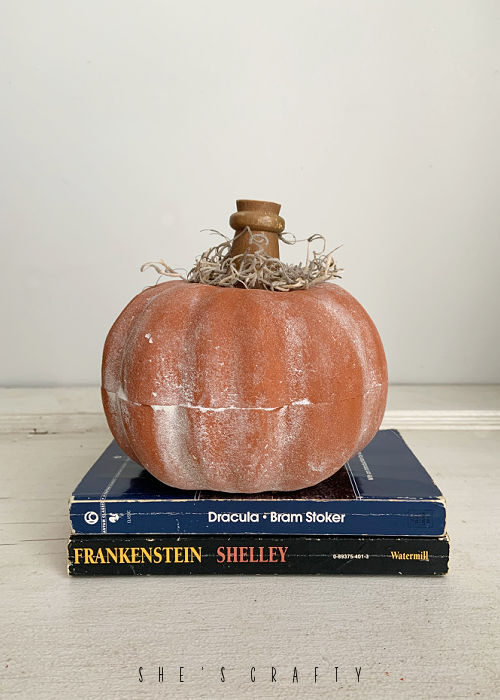 Painted Styrofoam pumpkins to look like terra cotta.