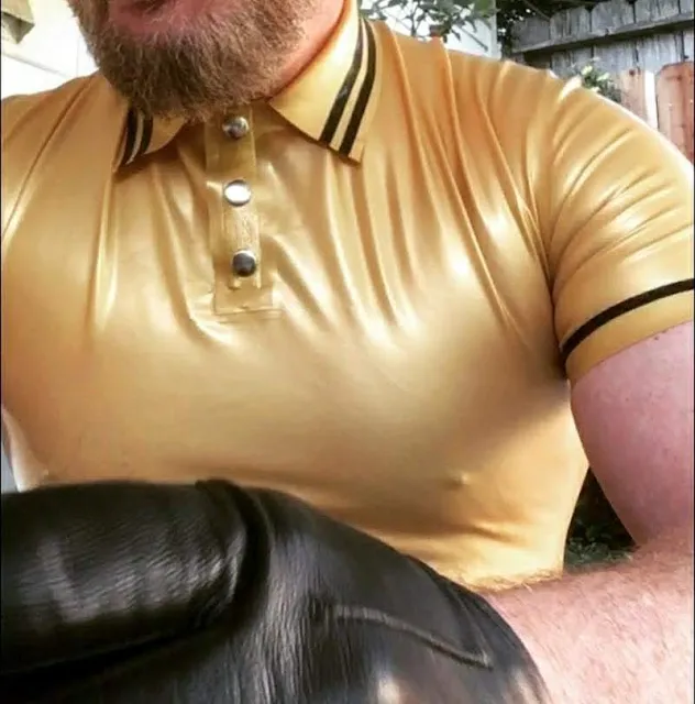 Glovedman74 wearing tight yellow gold latex shirt with black leather gloves