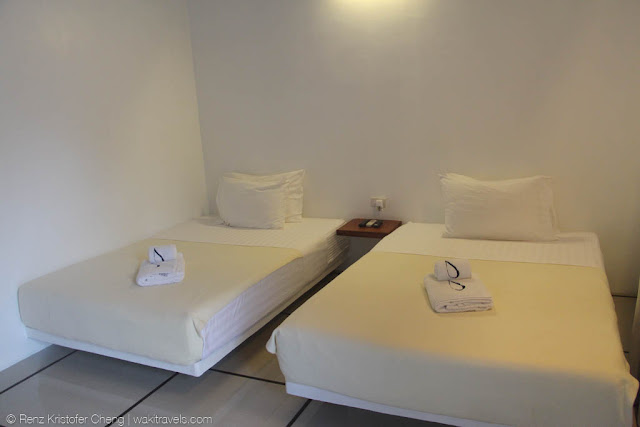 Room and beds of Blue Palawan Resort