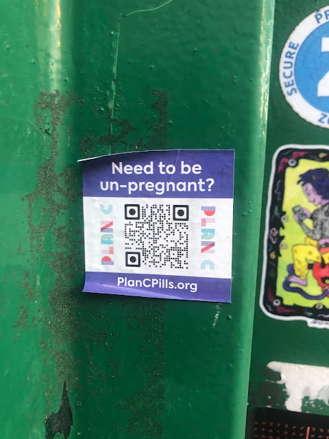 Sticker with QR code and the following message: "Need to be un-pregnant? PlanCPills.org"