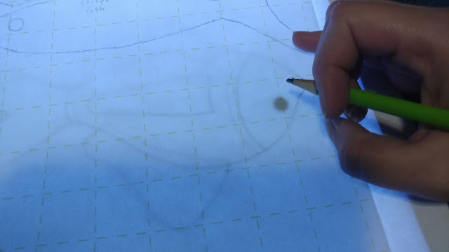 Using a light pad to trace applique shapes