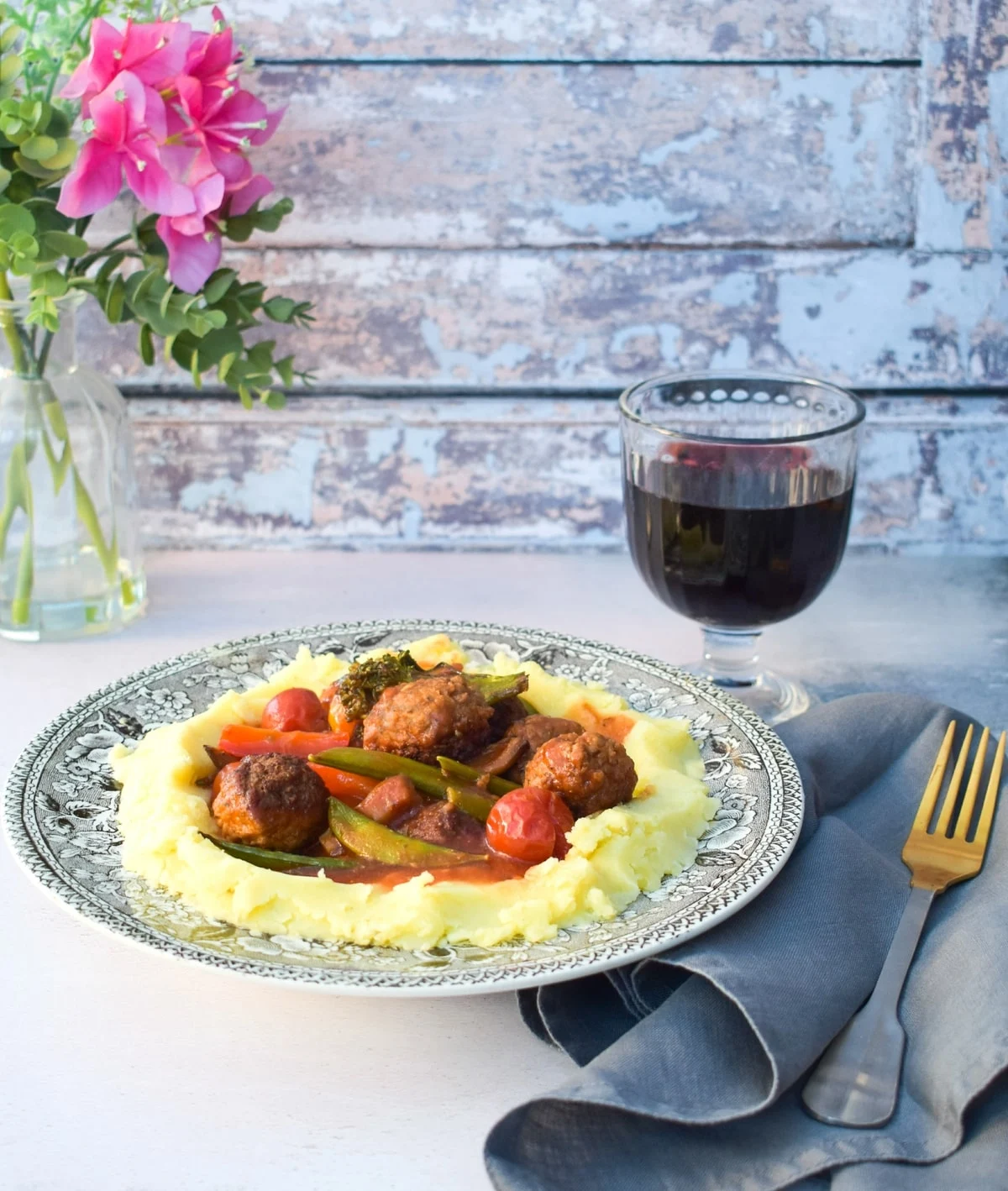 vegetable bake served on a bed of creamy mashed potato