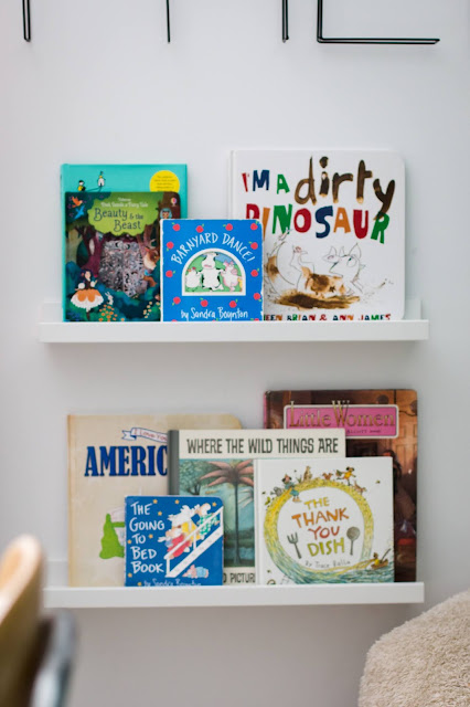 Use book ledges as a space saver in a small playroom