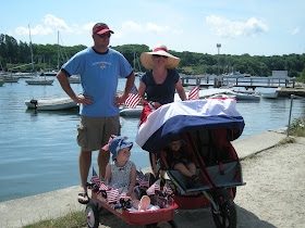 family at boat harbor on July 4th