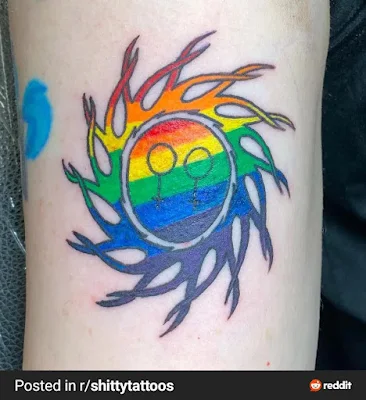 Colorful rainbow pride tattoo on arm symbolizing LGBTQ+ love and unity