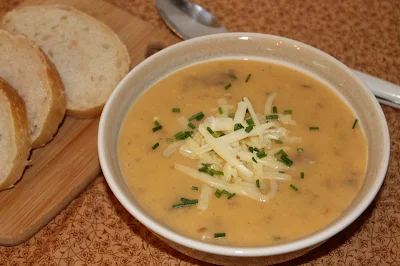 Serving baked potato soup.