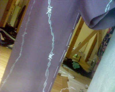 Barbed wire design. Girdles purple kimono. Cowboy or tattoo? Barbed wire design. Girdles purple kimono. Cowboy or tattoo?