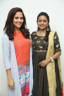 Actress Suma in Black Salwar Suit and Anusuya in orange Dress at winner movie press meet part 1 February 2017 (19).JPG