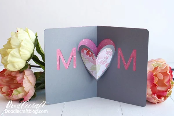 Make a beautiful Mother's Day Heart Pop-Up Card DIY with the Cricut Maker using the scoring tool.