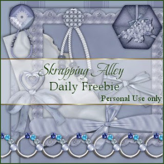 http://skrappingalley.blogspot.com/2009/06/daily-freebie-mini-kit-blue-grouping.html