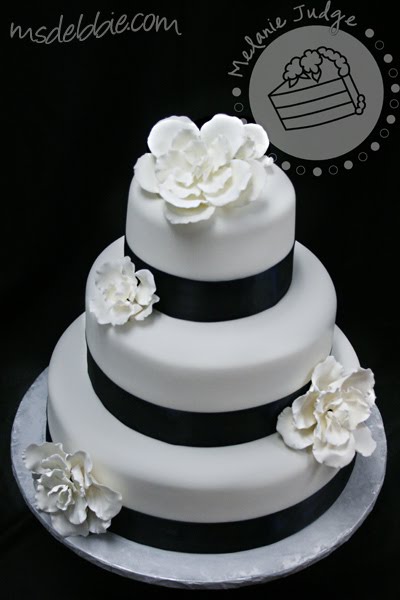 For example this cake was simply covered in white fondant and had a navy 