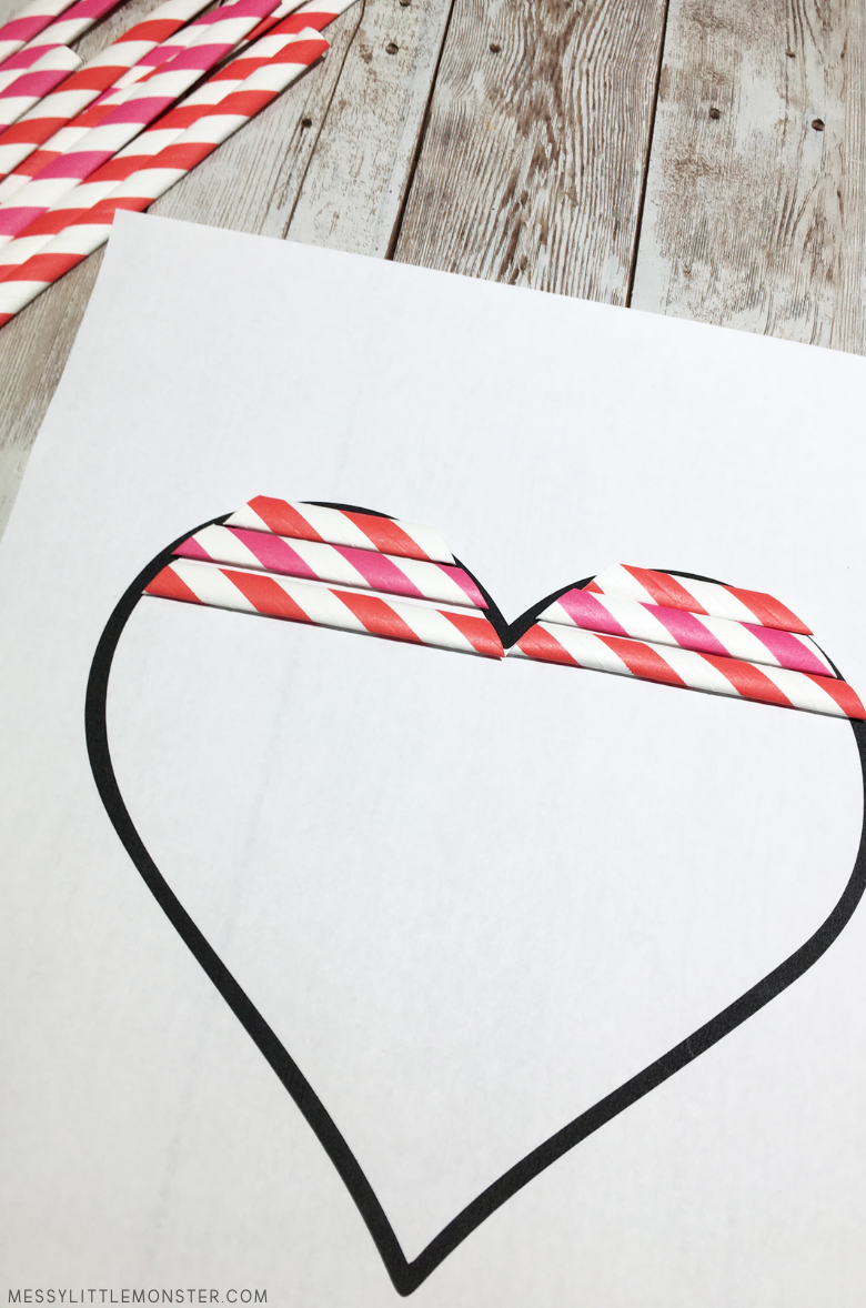 add paper straws to hanging heart craft