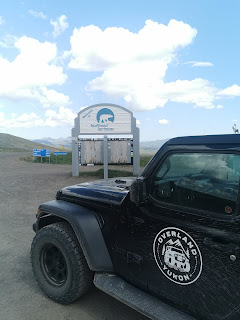 Overland Yukon Jeep at the NWT border