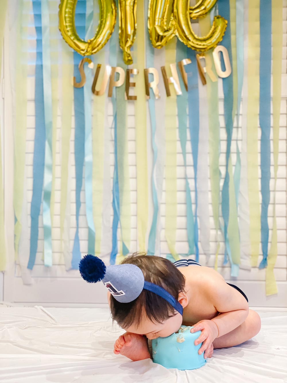 DIY Superhero Cake with marshmallow fondant and handmade cake toppers