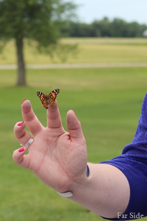 One of the bridesmaids with a butterly