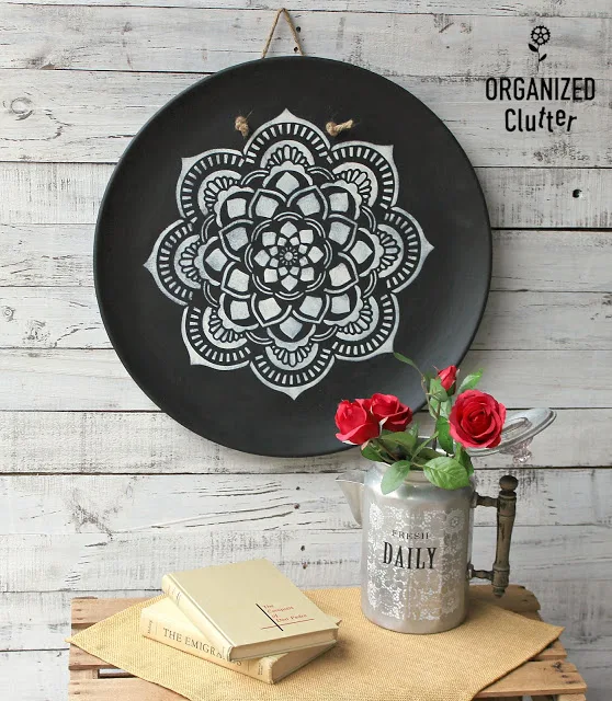 Photo of mandala stenciled on a large wall platter