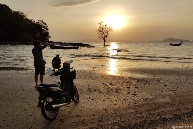 Klong Muang Beach next to Nakamanda Resort during low tide and sunset